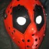 Side angle of the Deadpool hockey mask highlighting the removable straps.