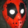 Side angle of the Deadpool hockey mask highlighting the removable straps.