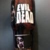 Front view of the Evil Dead tumbler featuring vivid artwork inspired by the cult classic movie.