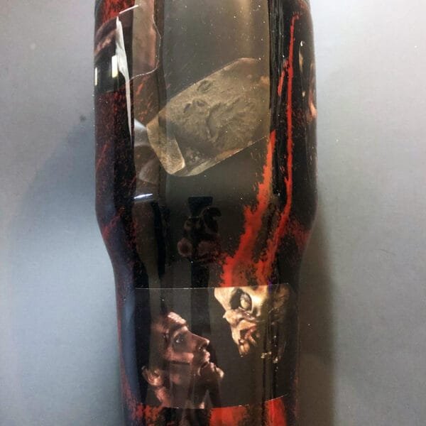 Additional side view of the Evil Dead tumbler, showing off its wraparound design.