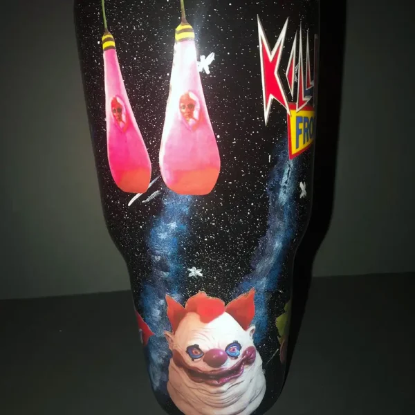 Back view of the tumbler, showcasing space-inspired elements and the film logo.