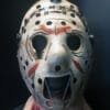 Front view of Leatherface Hockey Mask showcasing stitched design and distressed finish.