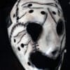 Angled view of the Leatherface Slaughterhouse Mask featuring dark stitched details and a jagged mouth design.