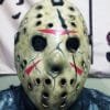 Front view of the Mortal Kombat X Jason Mask featuring a weathered finish, black cracks, and red chevrons.