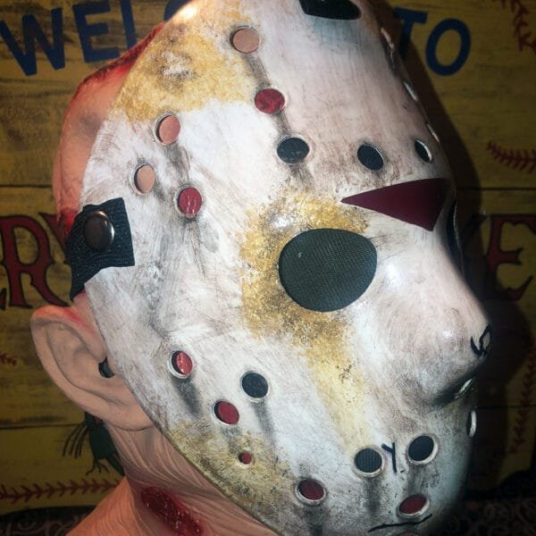 Full side view highlighting the removable straps and Jason Voorhees’ decayed appearance.